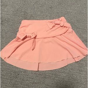 bow detail pink mini skirt